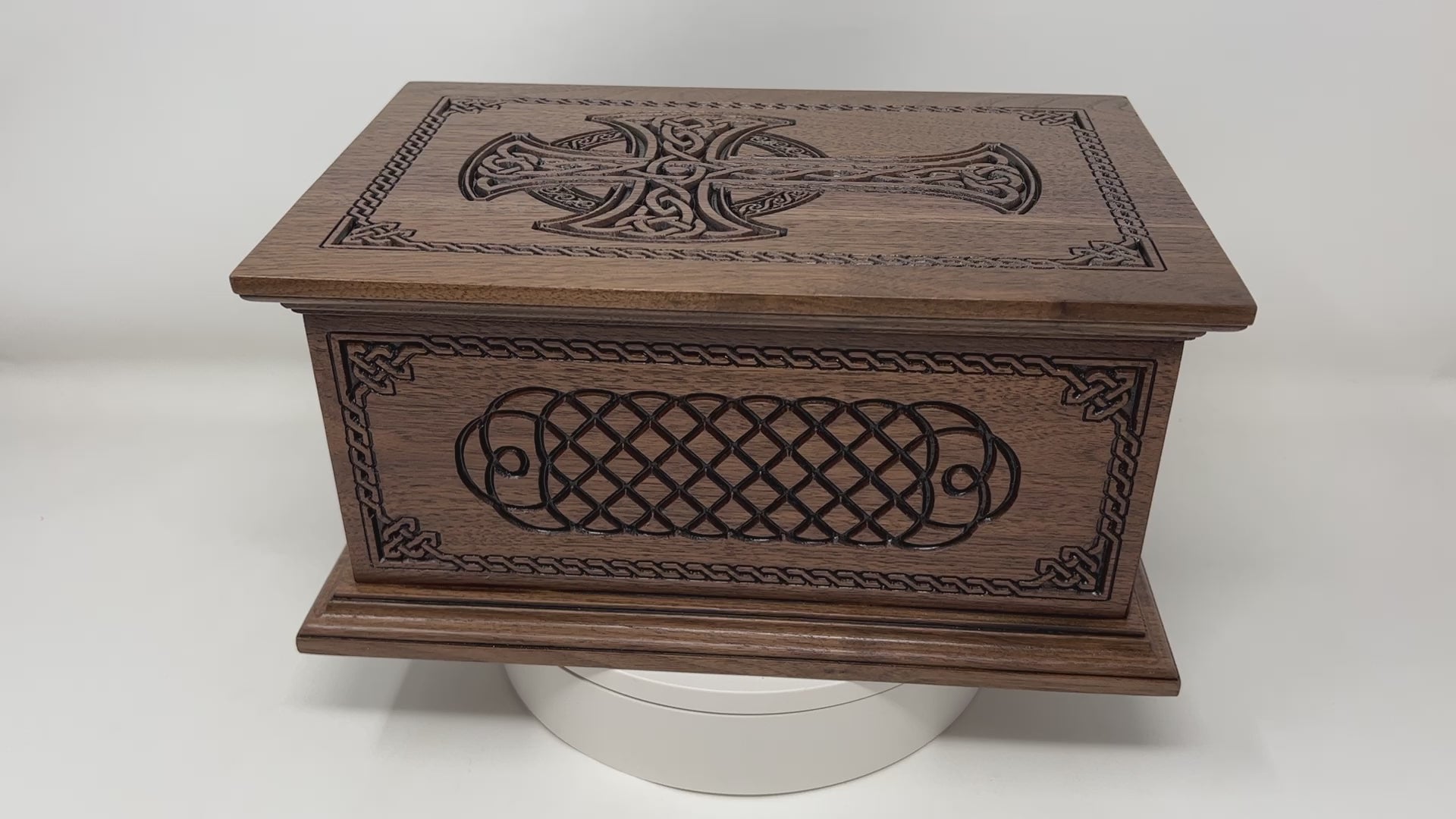 Video imaging of the celtic cross and weave urn spinning so the customer can view the urn for human cremation ashes from all sides and angles.