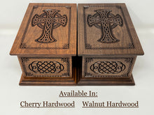 Load image into Gallery viewer, This image shows the distinct color differences between the finished cherry and finished walnut hardwoods available for these urns. The cherry is a distinct red-ish golden brown, whereas the walnut is a deeper darker brown color.
