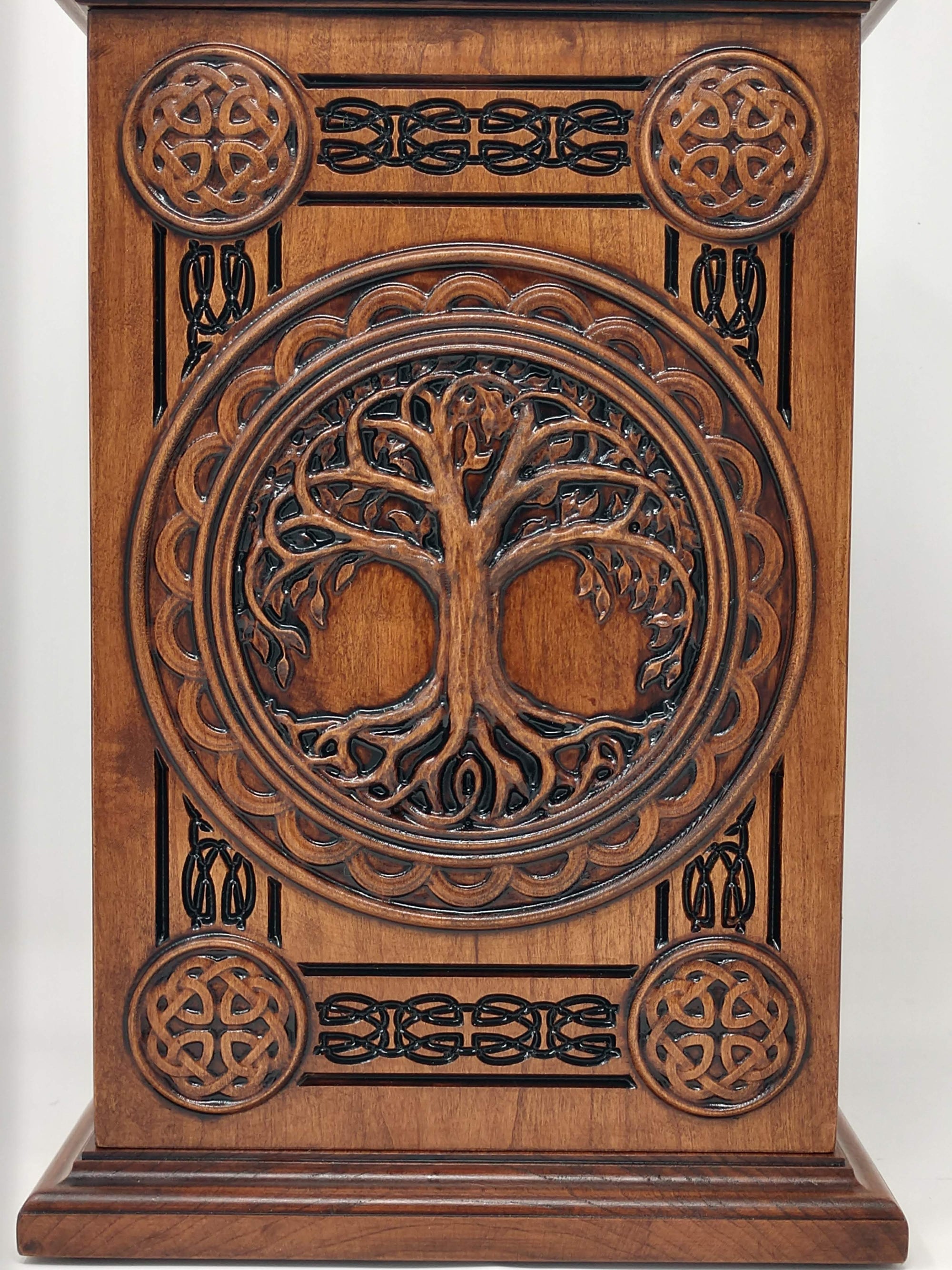 Close up of the Celtic Tree of Life carving and ornate boarders for the urns cremation urns